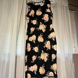 Black fitted dress with floral design, cute cutouts on shoulder